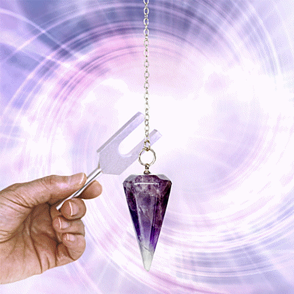 Crystal Tuner Tuning Fork Clearing a Crystal Pendulum.