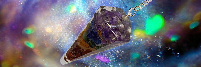 Orgone pendulum surrounded by visualization of orgone energy.