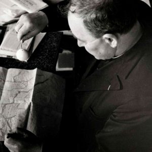 Abbe Mermet using a pendulum.