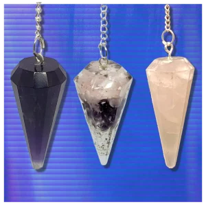 Amethyst, Orgone, and Rose Quartz crystal pendulums. Amethyst, Orgone and Rose Quartz Crystal Pendulums.