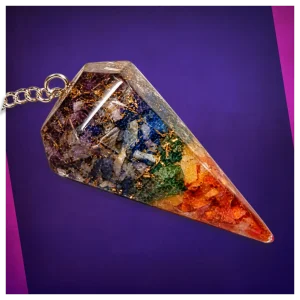 Orgone chakra layered crystal pendulum. Orgone chakra layered crystal pendulum.